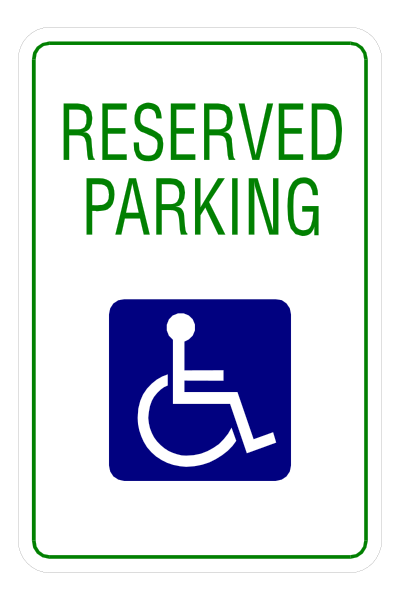 The picture shows a parking sign with "reserved" written on it next to an accessible symbol indicating handicapped accessibility for vehicles in that space.