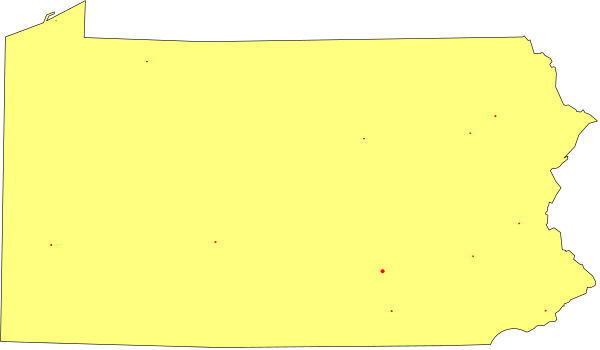 The image shows a yellow sign with red dots on it against an indistinct background that appears to be black.