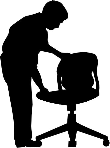 The black and white photo shows a person standing on top of another object that appears to be an escalator with steps leading upwards from it; there is no visible text in this image.