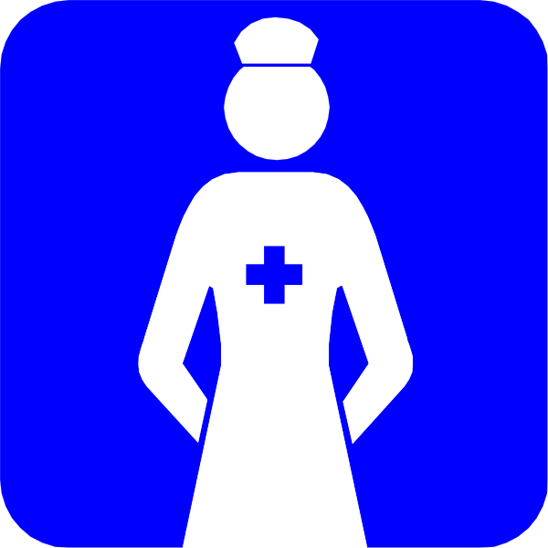 The image shows a blue sign with white text featuring an icon of a nurse standing next to it on what appears to be a street corner at nighttime.