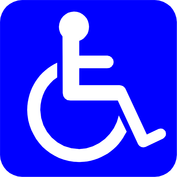 The image shows a blue handicap sign with white text indicating that it is for wheelchair users only.