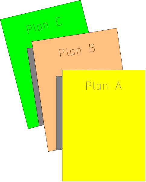 The image shows a set of four colorful papers with text on them placed next to each other against a dark background; there is no visible human activity in this still life composition.