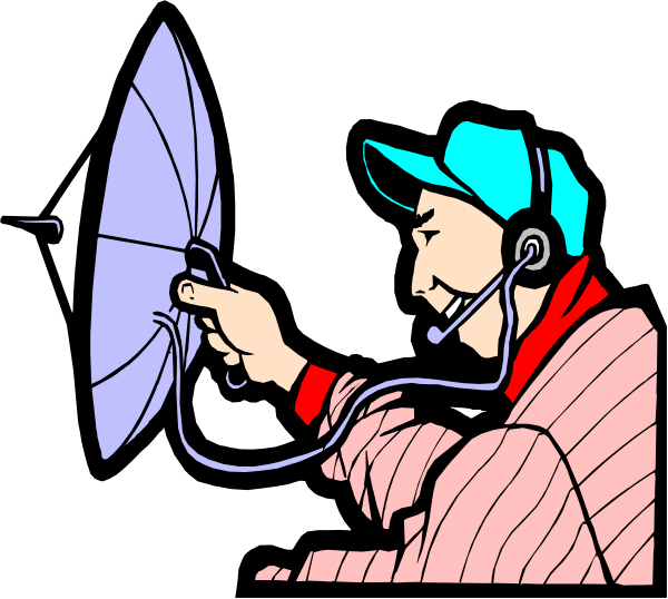 The image shows a person operating an old radio with headphones on their ears while sitting at a desk.