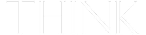 The image shows a black line with white text on it against an indistinct background that appears to be grayish-brown in color.