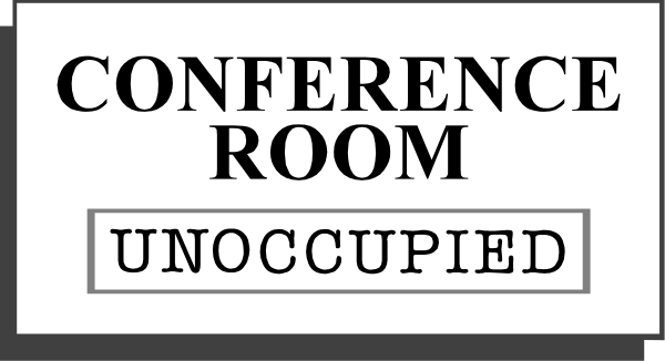 The image shows a sign that reads "CONFERENCE ROOM UNLOCKED" with an arrow pointing to it from above.