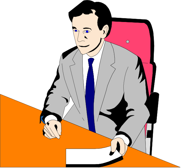 The image shows a man sitting at an orange desk with papers on it; he is wearing a suit and tie and appears to be writing something down while looking up from his work.