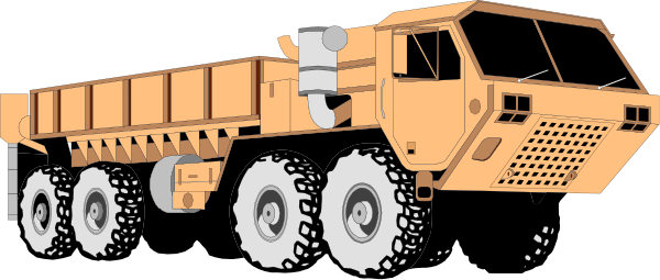 The image shows a large orange truck with six wheels parked on an unseen surface next to what appears to be a small building structure in front of it.