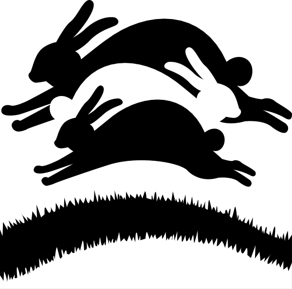 The black silhouette of a rabbit jumping over grass with its ears flapping back against an open sky background.