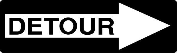 The image shows a sign with an arrow pointing left that says "DETOUR" on it against a gray background.