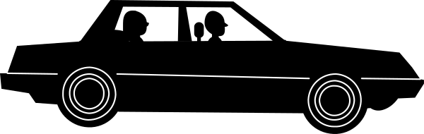 The image shows a black car with two round headlights on top of it parked next to an unidentified object that has three circles in its center.