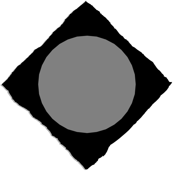 The black and white photo shows a large circle with two cracks on either side of it against an indistinct background that appears to be dark in color.