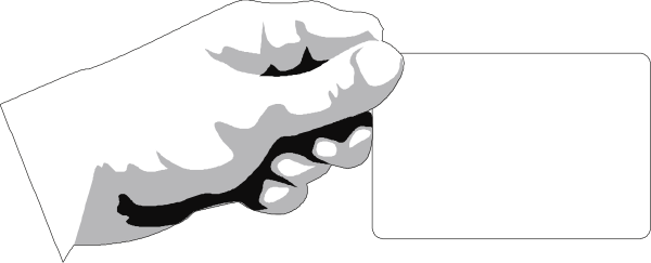The black and white photo shows a person's hand holding an object that resembles a phone with buttons on it against a blurred background of what appears to be a room interior.