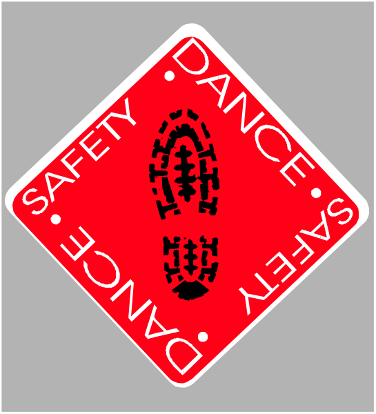 The image shows a red sign with white text that reads "DANCE SAFETY" on it.