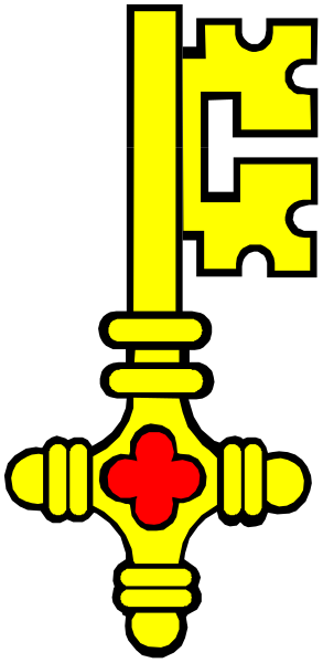 The image shows a key with two crosses on it against a black background.