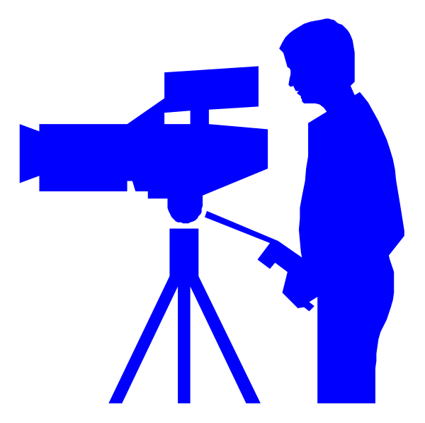 The image shows a blue silhouette of an adult male standing behind a camera tripod with his back to us; he is holding what appears to be a video recording device in one hand while pointing at something off-camera, possibly directing someone's attention or gesturing towards the scene being filmed.