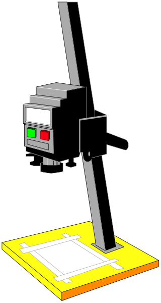 The image shows a black and white illustration of an industrial robot with two arms positioned above what appears to be a yellow platform on which there is some sort of object that could possibly represent paperwork due to its rectangular shape, but it's not clear from this angle or resolution if the item has any specific details. The background is dark grey and does not provide additional context about setting or environment beyond being an industrial space with no visible human activity in sight.