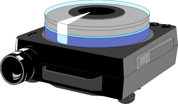 The image shows a black projector with an attached blue lens on top of it against a dark background.