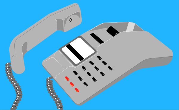 The image shows a telephone with buttons on it placed next to an old pushbutton phone that is connected by wires.