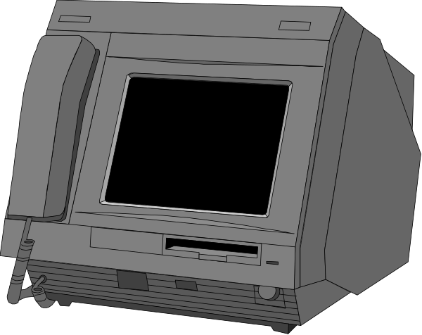The image shows a gray computer monitor with an open laptop on top of it next to what appears to be a printer.