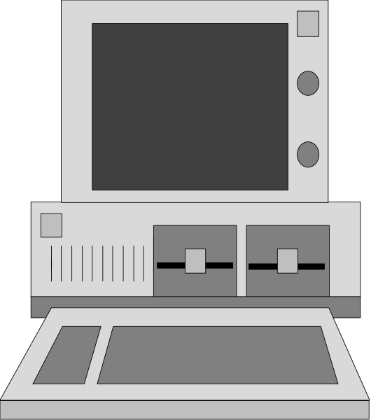 The image shows a computer monitor with an open laptop on top of it next to what appears to be some sort of control panel or interface device in front of them both.
