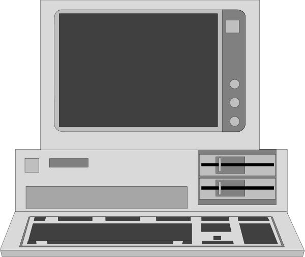 The image shows a computer monitor with an open laptop next to it on what appears to be a desk surface against a dark background.