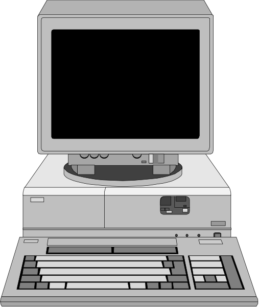The image shows a desktop computer with an open keyboard on top of it against a dark background.