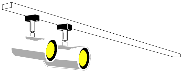 The black and white illustration shows a train with two headlights on its front car passing by at night under an overpass bridge that has lights illuminating it from below.
