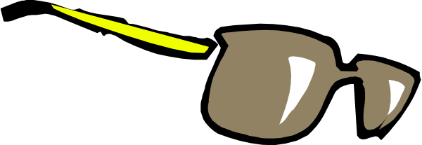 The image shows a black cat with yellow eyes sitting on top of an orange cone against a gray background.