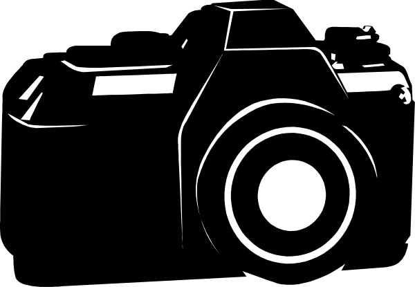 The black and white silhouette of a car with its headlights on against an indistinct background.