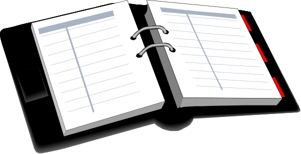 The image shows an open spiral notebook with a red pen on top of it placed against what appears to be another booklet in front of them both.
