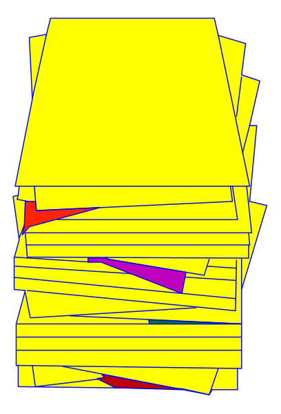 The image shows a stack of papers with various shapes on them placed against a black background.