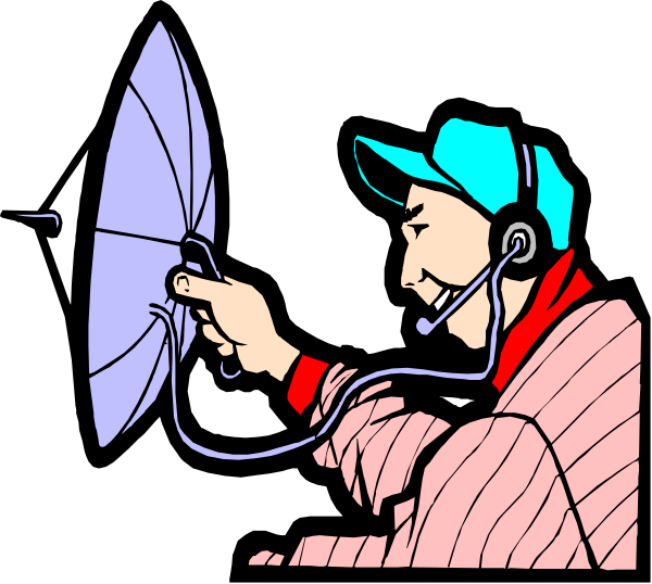 The image shows a man operating an old radio device with headphones on his ears while sitting at a table inside what appears to be a recording studio booth.