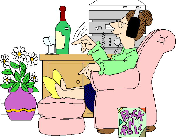The cartoon depicts a woman sitting on an armchair with her feet up while holding a book titled "Rock 'n' Roll." She is wearing glasses and has brown hair tied back in a ponytail, suggesting she might be older than middle age. To her right sits a cat that appears to have been recently groomed or brushed due to the presence of fur on its head and neck area. In front of them both are two vases filled with flowers; one is purple while the other has yellow blooms. The background features an easel displaying what seems like artwork,