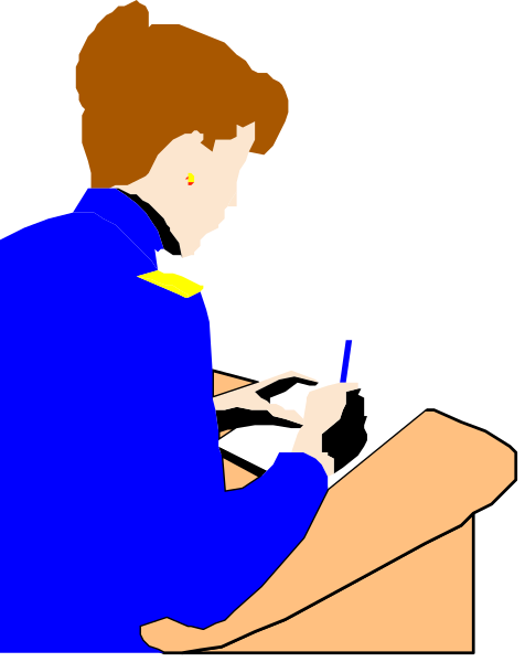 The image shows a woman sitting at her desk with papers on it; she is writing something down using pen while looking to the side of the paper.