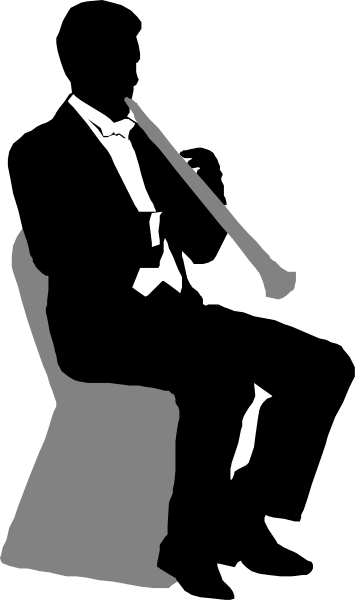 The black and white photo shows a person holding an umbrella on their head while standing outside during rainy weather.