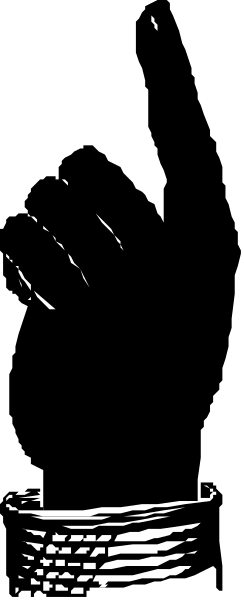 The image shows a black and white photo of an object that appears to be a bottle with liquid inside it placed on top of another surface which is out of focus due to motion blur effect in photography.