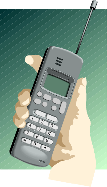 The image shows a hand holding an open flip phone with buttons visible on its screen; it is set against a green background that resembles grass.