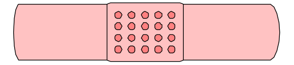 The image shows a pink pill with three holes on it placed next to an object that resembles a black tube of toothpaste in front of what appears to be a gray wall.