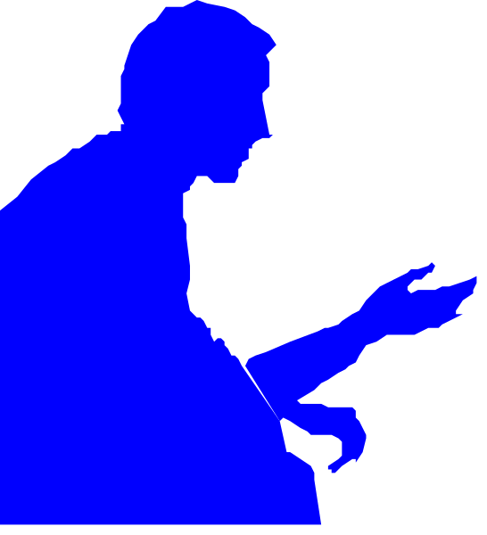 The image shows a silhouette of an adult male figure with his hands raised as if gesturing while speaking to someone else who is out of frame on what appears to be a stage set against a dark background, possibly indicating that this could represent a public speaker or lecturer in action during their presentation.