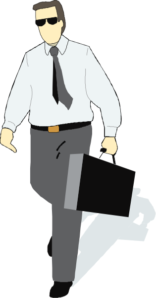 The image shows a man walking on sidewalk with his hands behind him; he is wearing sunglasses, dress shoes without socks, shorts, shirt, tie, belt, and has short hair.