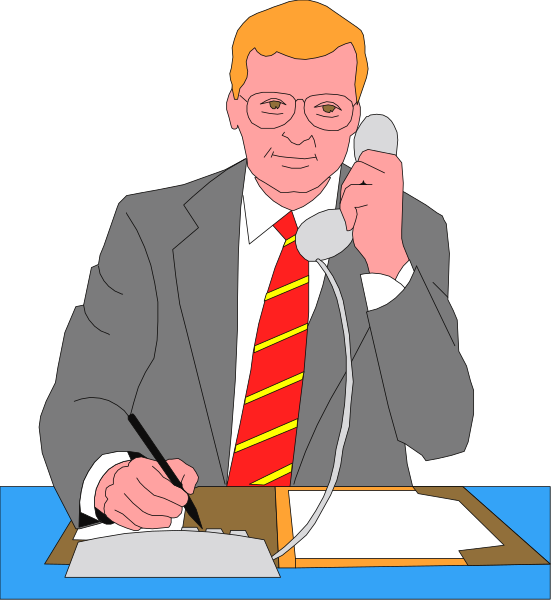 The cartoon depicts a man sitting at an office desk with papers on it, wearing glasses, holding a pen over them as if signing off documents; he is dressed in business attire including a red tie that stands out against his suit and shirt.