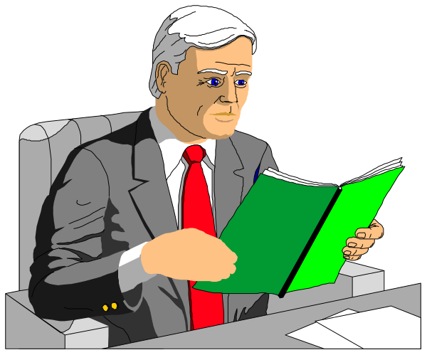 The cartoon depicts a man sitting at his desk with an open book before him; he is wearing glasses and appears to be reading from it while seated in front of what looks like a computer screen on which there's some text, possibly indicating work-related tasks or information being displayed.