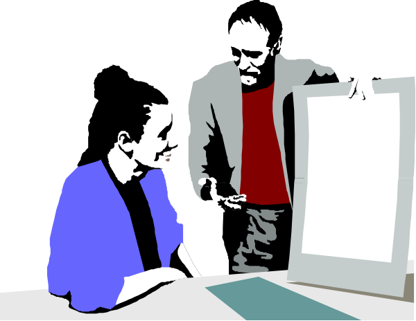 The image shows a man standing next to an open laptop with papers on it while pointing at something offscreen; he is wearing glasses and has short hair. A woman stands in front of him looking downward towards what appears to be some kind of document, possibly related to real estate or property management given the context provided by the text "Real Estate" above them. The setting seems professional with a desk visible behind them.