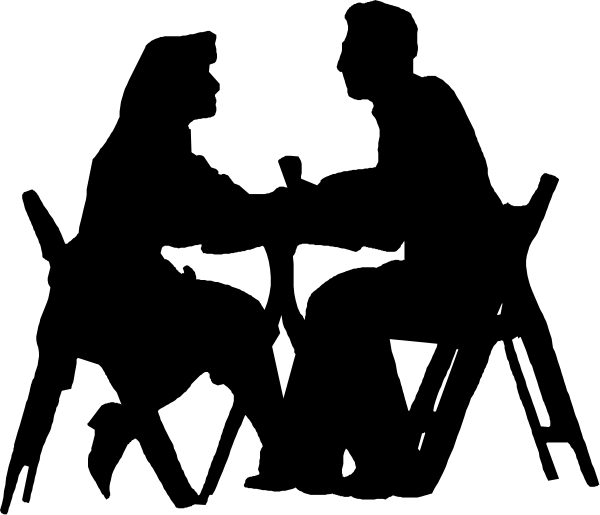The image shows a black silhouette of an animal with large eyes against a dark background.