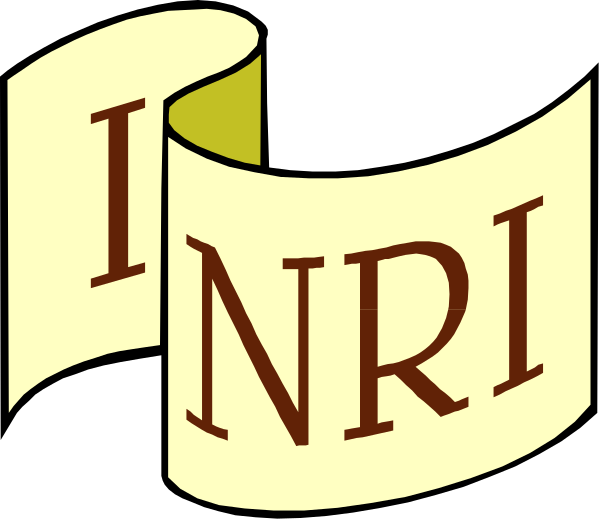 The image shows a roll of paper with text that reads "INRI" on it, placed next to another piece of rolled-up paper displaying an acronym in red letters against a white background; both rolls appear to be part of some sort of document or signage.