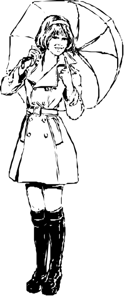 The black and white photo shows a woman standing with her arms crossed against a dark background; she is wearing high heels and has blonde hair styled in an updo.