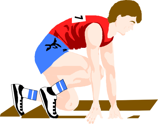 The image shows a male athlete crouched on his knees with hands resting flat against an indoor floor surface that appears to be wood; he is wearing shorts and sneakers without socks, suggesting athletic attire for running events such as track racing.