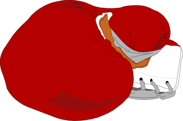 The image shows a red santa hat with white fur trim on top of it lying next to what appears to be an object that resembles a small black cat wearing glasses in front of a gray background.