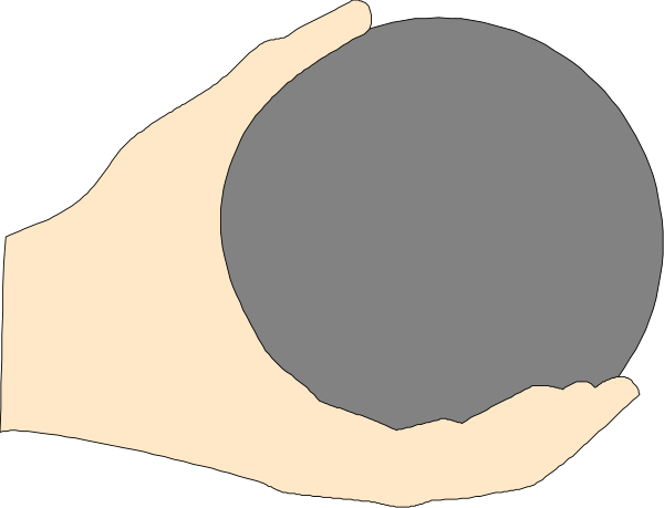 The image shows a hand holding an object that resembles a ball of gray material with black markings on it against a white background.