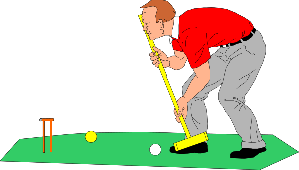 The image shows a man playing golf on an indoor putting green with clubs and balls visible; he is wearing red clothing and holding a club in his right hand while bending over to pick up another ball from behind him, which appears as if it's being thrown by someone or something off-screen.